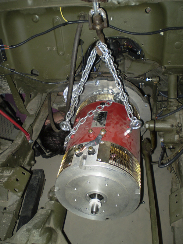 lifting motor into engine compartment