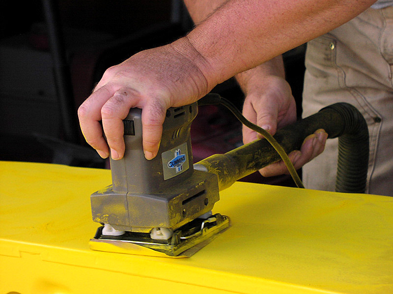 sanding the painted tub